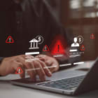 Businessman with financial warning icons and alert symbols, cybersecurity risk and fraud detection concept, online banking security, data breach prevention, financial compliance monitoring.