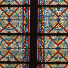 Paris, France, March 27, 2017: Stained glass window at Notre Dame cathedral. Notre Dame church is one of the top tourist attractions in Paris. Inside the old Gothic landmark of Paris