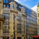 Paris, France – August 31th 2013 : Building of the Ministry of Culture. Its covered by Francis Soler&rsquo;s silver mesh. These metal interlacings have been laser cut. Style is baroque, almost art nouveau.