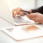 shopping and online payment by using laptop computer and tablet with credit card