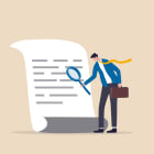 Document checking, agreement or contract validation, financial or budget analysis, search for document files concept, businessman manager holding big magnifying glass checking document paper.
